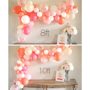 A size example shows a 8 foot and 10 foot balloon garland made up of coral, pearl peach, rose, white, and matching confetti filled balloons sitting above a 6 foot table for comparison.