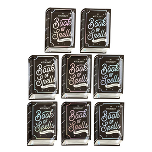 A set of 8 black book of spells shaped plates with holographic foil accents sit on a white background.