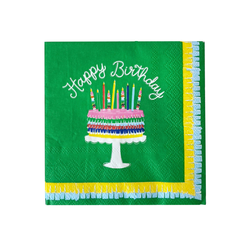 Green birthday napkin with a colorful birthday cake on the design and the words Happy Birthday in white cursive lettering.