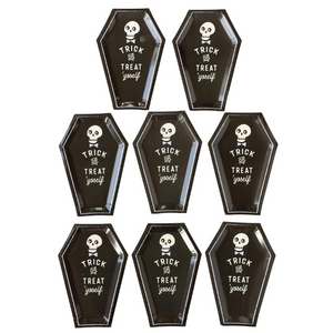 A photo of 8 black coffin shaped plates for Halloween parties.