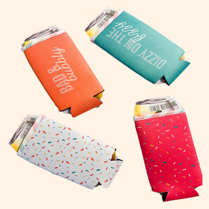 Four fun can holder koozies in four different colors; aqua, orange, white confetti, and pink confetti.