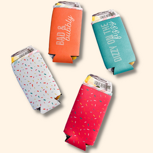 Four fun can holder koozies in four different colors; aqua, orange, white confetti, and pink confetti.
