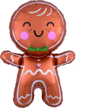 Giant gingerbread man balloon on white background.