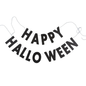A photo of a black glitter HAPPY HALLOWEEN banner on a white background.