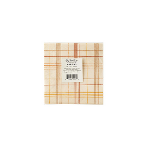 A photo of the back of a beige cocktail napkin with orange and yellow stripes making a plaid pattern.