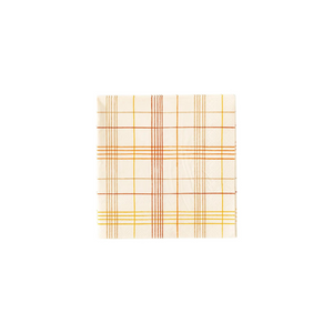 A photo of beige cocktail napkin with orange and yellow stripes making a plaid pattern.