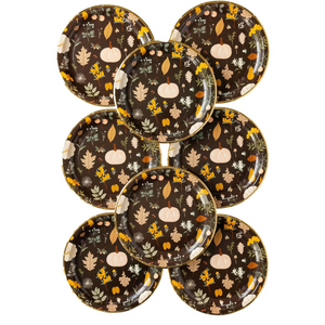 A set of 8 black plates with printed pumpkins and fall leaves sit on top of each other on a white background.. Perfect for Thanksgiving or Friendsgiving gatherings.