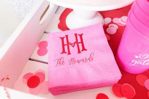 Hot Pink, Red, Pink, Blush Tissue Confetti lays on a table with pink Galentines cups and custom pink napkins.