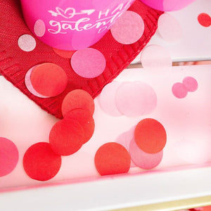 Hot Pink, Red, Pink, Blush Tissue Confetti lays on a table.