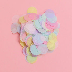 Pile of pastel colored hand cut tissue confetti paper.