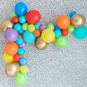 Party animal balloon garland with the colors chrome gold, orange, caribbean blue, yellow, periwinkle, lime, spring lilac and either red or wildberry.