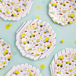 Construction theme paper plates on white background.