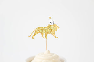 Gold zoo lion cupcake topper with mini party hat.