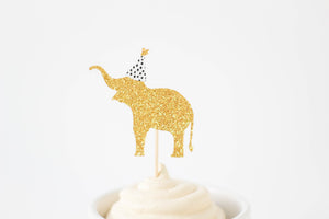 Gold zoo elephant cupcake topper with mini party hat.